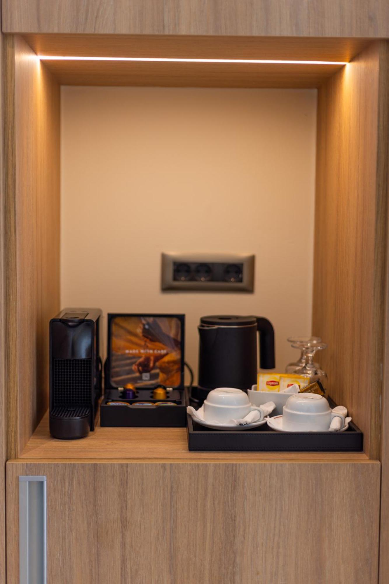 Pegasos Deluxe Beach Hotel Faliraki Eksteriør billede A Nespresso coffee machine in a hotel room
