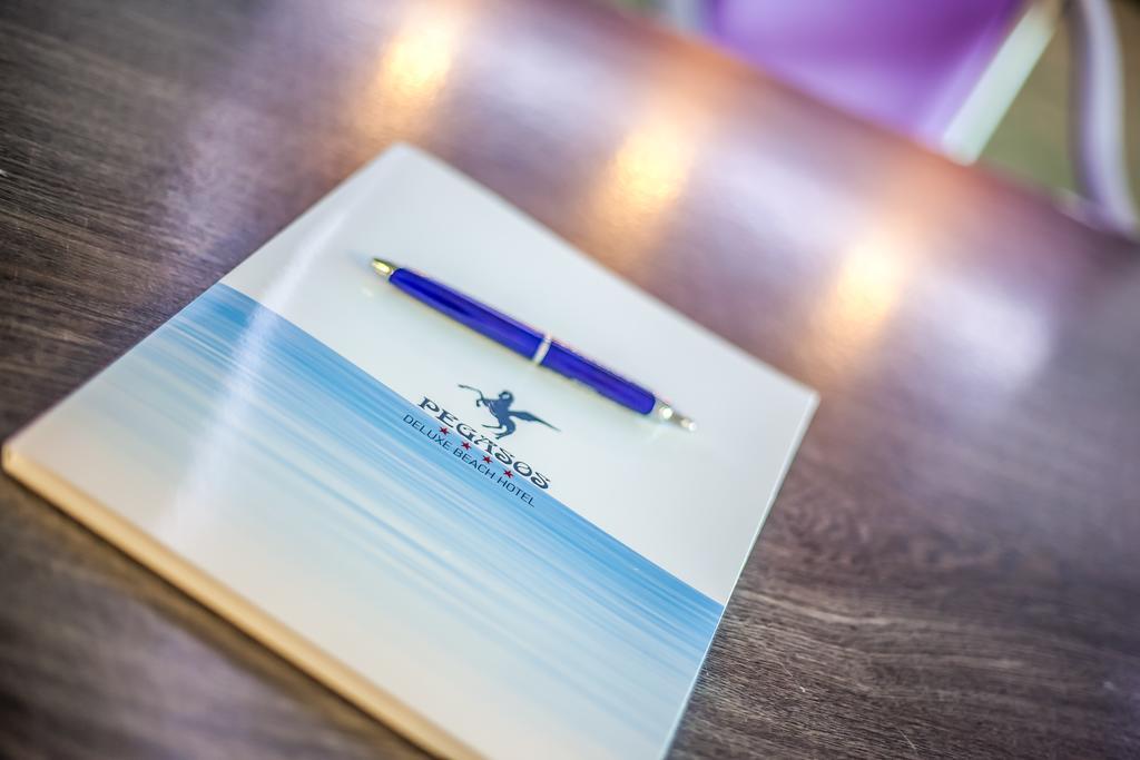 Pegasos Deluxe Beach Hotel Faliraki Eksteriør billede A pen and a notepad
